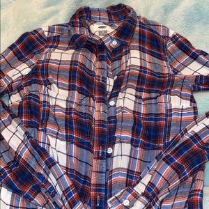 Plaid button up shirt.
